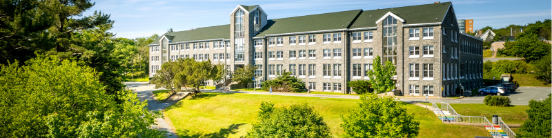 Evaristus Hall, taken by a drone looking directly at the building in the summer