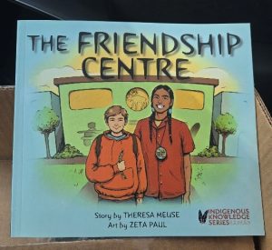 The book, The Friendship Centre, story by Theresa Meuse and art by Zeta Paul