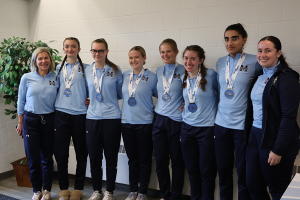The MSVU Women's Cross Country Team, wearing their silver medals