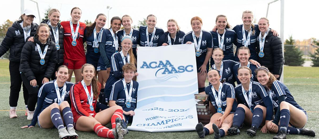 The Mount Saint Vincent University Women's Soccer Team, holding the ACAA Champion pendant