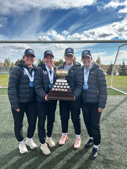 The 4 female coaches for the MSVU Women's soccer team: Ashley Poirier, Jenna Blackburn, Abby MacLeod, and Lauren Windsor