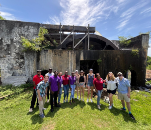 Tanner Saunders, on the far right, posing with a group of volunteers