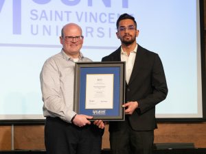 Arpit Sharma receiving the Mount Co-op Student of the Year (Business Administration)