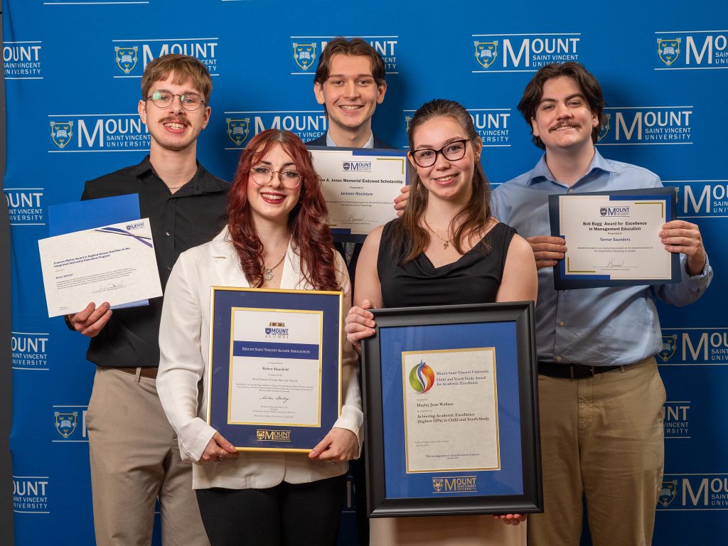 Five students holding up their awards received at the MSVU Student Awards ceremony