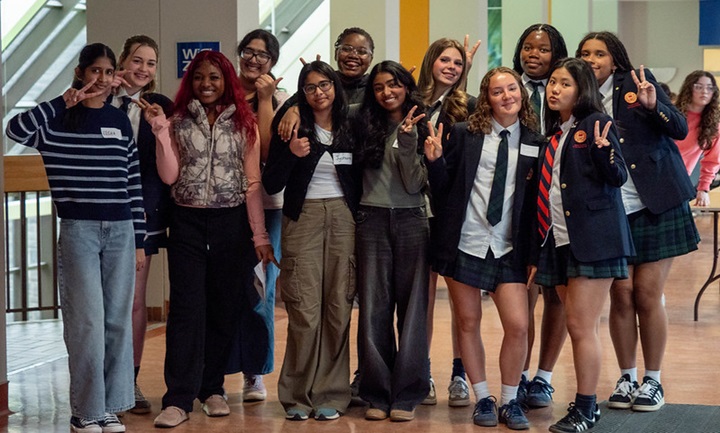 Several girls posing for a group photo in Rosaria for Girls Conference