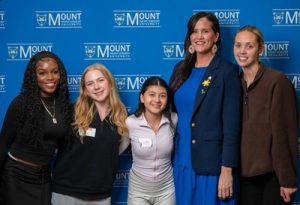Leah Martin and some girls posing for a photo
