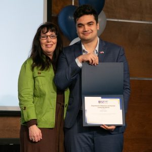 Keith Gallie receiving the Department of Business and Tourism Leadership Award