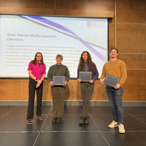 Tayvie Cunningham, Owen Horn, and Levi Parker, receiving the Sister Patricia Mullins Award in Chemistry