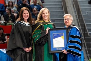 Dr. Andrea Fraser, receiving the Alumni Early Career Teaching Award