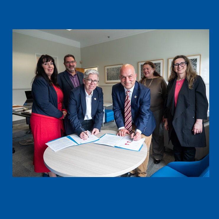Several MSVU Administrator and Tourism faculty, signing the Memorandum of Understanding with Dr. Ali Arouzi