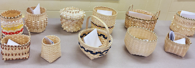 Several baskets woven by Mi'kmaw communities, now located at Glooscap Elementary School.