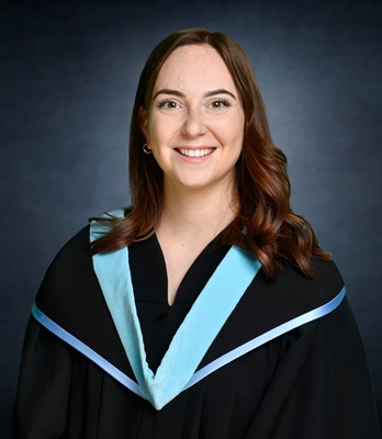 Sarah Monette, wearing a Bachelor of Education Convocation robe